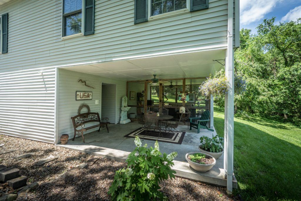 Covered back patio with seating